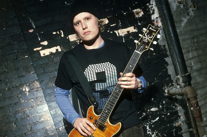 UNITED STATES - JANUARY 01: Photo of Matt ROBERTS and 3 DOORS DOWN; Posed portrait of Matt Roberts, full length, Ibanez guitar (Photo by Mick Hutson/Redferns)